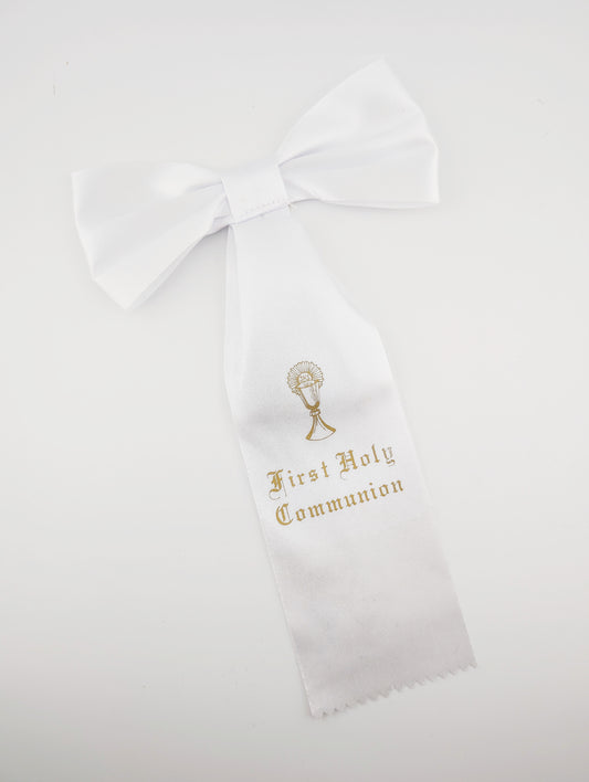 White sash with 'First Holy Communion' text and embroidered design on a white background