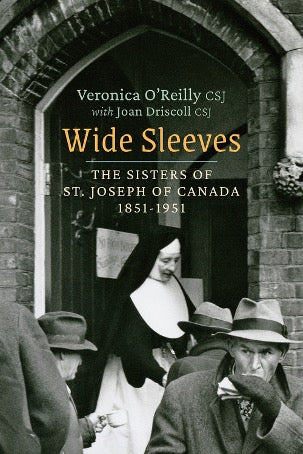 The image shows the cover of the book titled 'Wide Sleeves' by Veronica O'Reilly CSJ with Joan Driscoll CSJ. It features a black and white photograph of nuns in front of a church, with the title and the author's name prominently displayed.