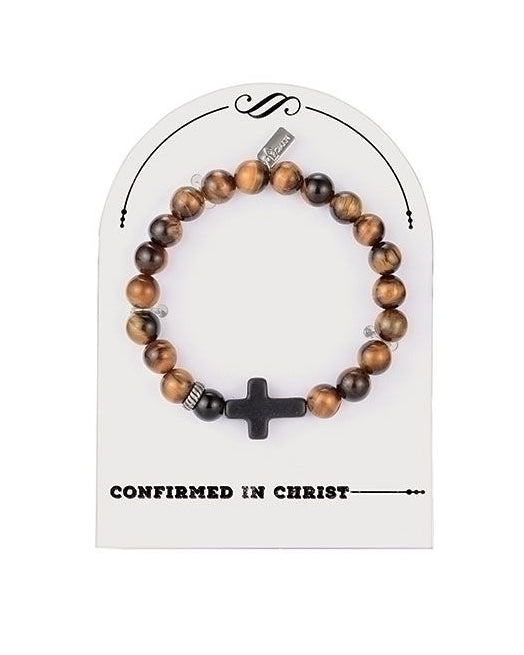 Wooden beaded bracelet with a cross on a white card with text