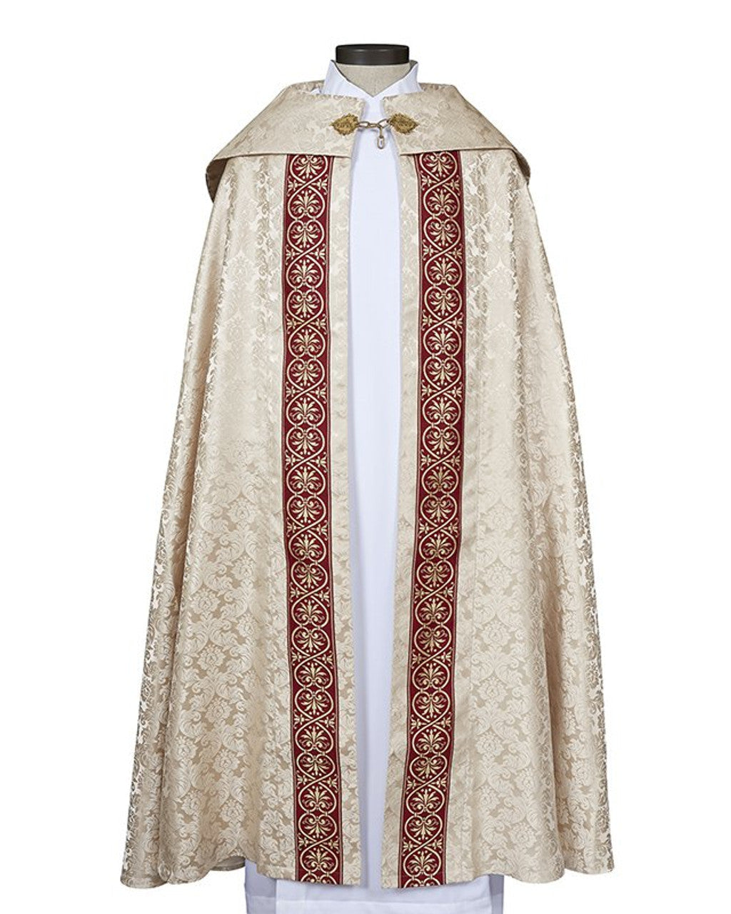 A traditional church cope with a white jacquard base and red and gold brocade design, featuring a metal clasp closure and a matching inner stole.