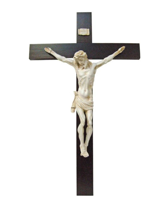 Statue of a crucifix with a dark cross and white figure on a white background