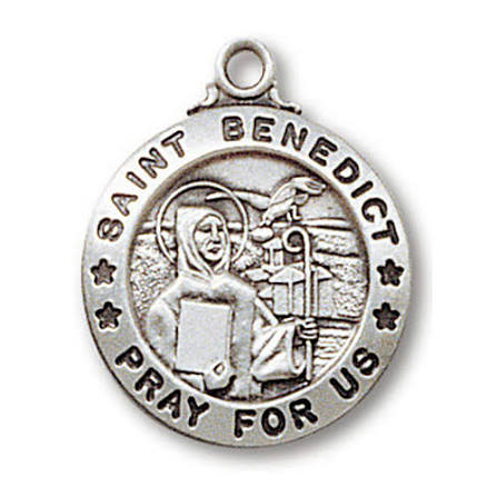 A round silver-toned Saint Benedict medal pendant with an engraved depiction of Saint Benedict holding a book and staff, surrounded by the text 'SAINT BENEDICT PRAY FOR US' and small star details, shown on a plain white background.