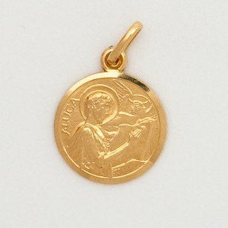 A small round 10K yellow gold medal with an image of St. Luke, gift boxed.