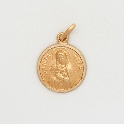A small round 10K yellow gold medal featuring an image of Santa Rita with a chain attached at the top.