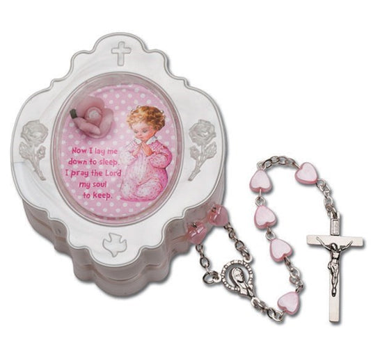 Rosario de bebé rosa en forma de corazón en caja de recuerdo