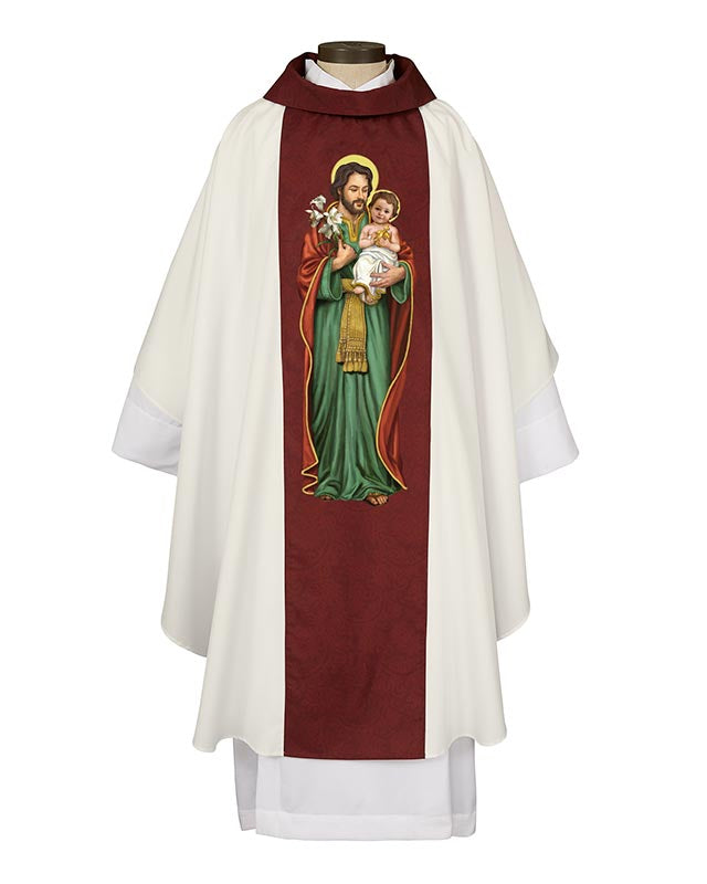 A chasuble featuring an artwork of St. Joseph holding the Child Jesus, with a predominantly white fabric and a red orphrey.
