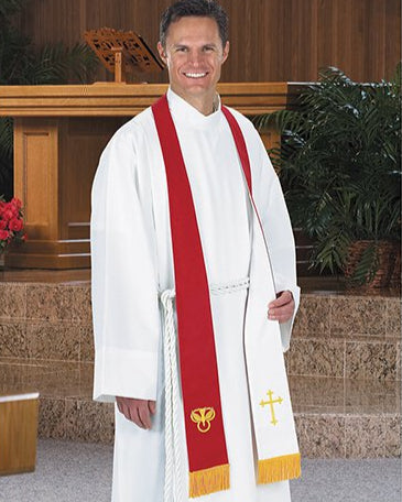 A person wearing a red and white reversible priest stole with embroidered symbols standing in a church.
