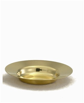 A gold-colored, round metal paten typically used in church settings.