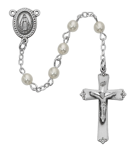 A sterling silver rosary with a cross and pearl beads.