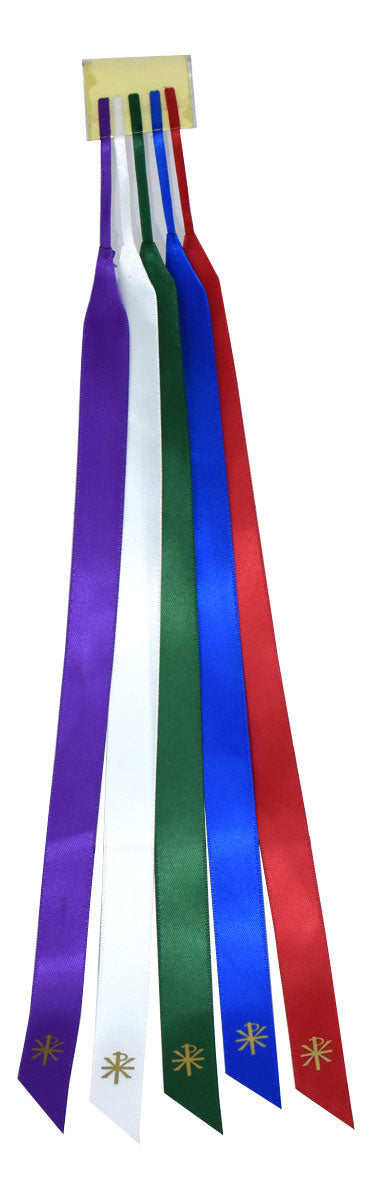A set of five replacement ribbons for the Roman Missal, displayed in a row with colors including red, green, blue, white, and purple, each adorned with a small gold star.