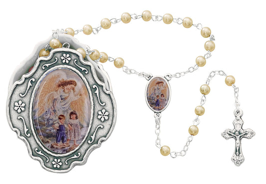 A silver rosary with a Guardian Angel picture on the box, featuring a 7mm pearl bead chain and a metal crucifix.