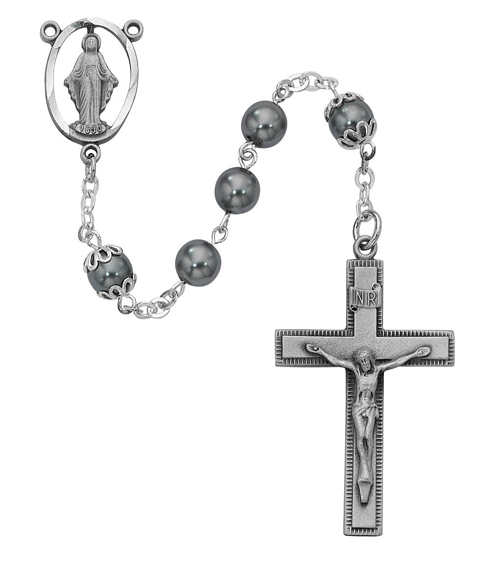 A silver and hematite imitation rosary with a crucifix and round beads, gift boxed.