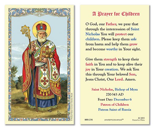 A laminated holy card featuring St. Nicholas the Patron Saint of Children with a prayer for children on the back.