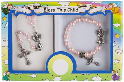 A boxed set containing a rosary and a bracelet with a metal cross and guardian angel centerpiece, displayed on a colorful background with illustrations of angels.