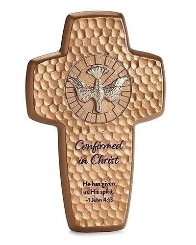 A brown resin stone mix wall cross with a message 'Confirmed in Christ He has given us His Spirit 1 John 4:13' inscribed on it.