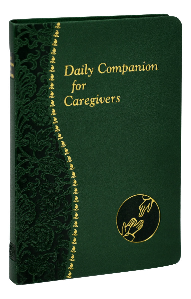 A green book with a title 'Daily Companion For Caregivers' printed on the cover, featuring a floral design and a hand symbol illustration in gold.