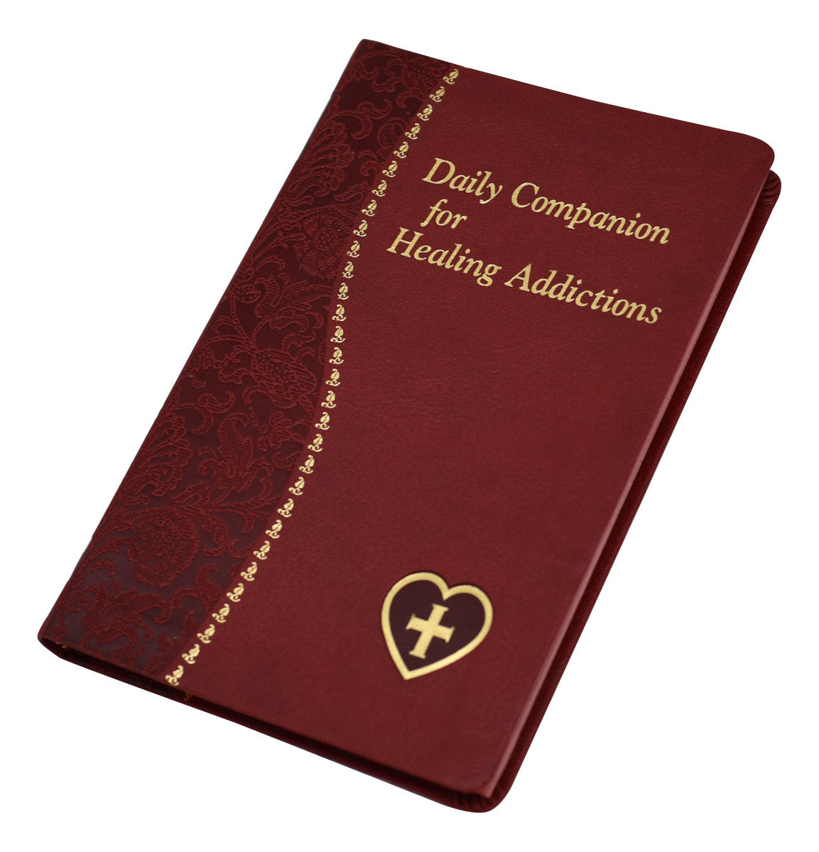 A closed book with a red cover titled 'Daily Companion for Healing Addictions' featuring a cross and heart symbol design.