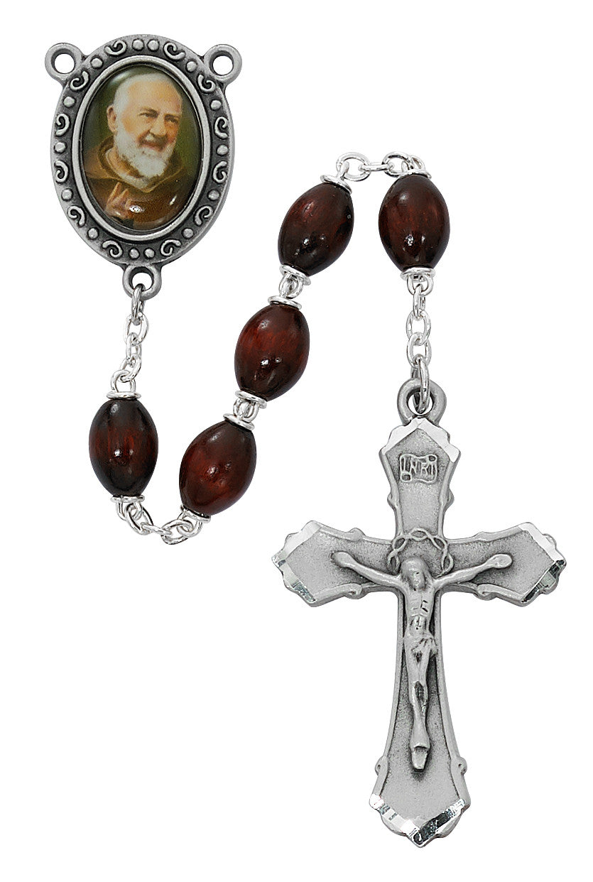 A St. Padre Pio themed rosary, featuring a pewter crucifix, a silver chain, and a center box with a portrait of the saint.