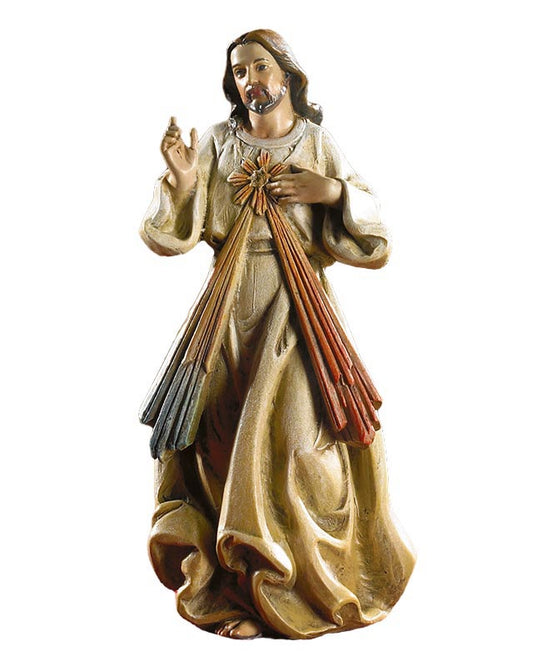 A resin statue of the Divine Mercy, 4 inches tall, depicting a figure with a halo, dressed in a robe, with extended hands.