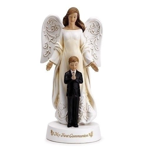 A statue of an angel with outstretched wings standing beside a young boy in a suit. Both are white, with the angel in beige robes.