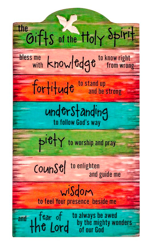 A multicolored wall plaque with various religious quotes written in different colors, titled 'Gifts of the Holy Spirit'.