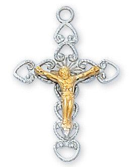 A sterling silver crucifix pendant with gold over the image of Jesus Christ on the cross, attached to a rhodium-plated brass chain.