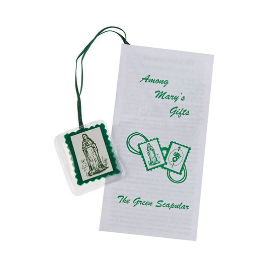A green scapular with a laminated design, including a picture of the Virgin Mary, attached to a card with the title 'Green Scapular' and a brief description on the back.