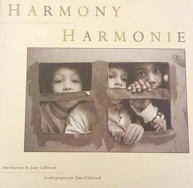 Cover of the book 'Harmony Harmonie' featuring a black and white photograph of three children looking out from a window.