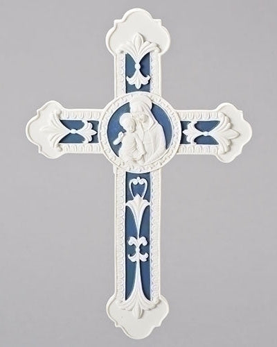 A white and blue colored wall cross with a sculpture of Madonna and Child in the center, featuring intricate detailing and a stylized crossbar.