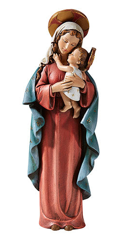 A figurine of the Madonna and Child, where the mother is holding the child in her arms. The figure is dressed in colorful robes and has a halo above her head.