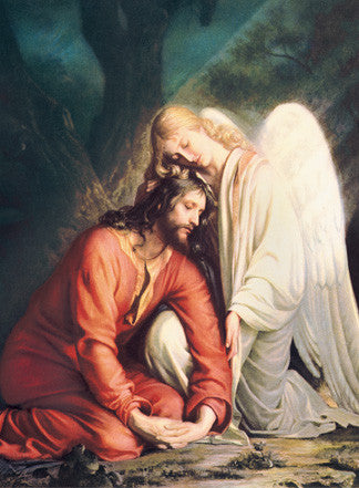 A print of Jesus with an angel, used as a mass card for religious purposes.