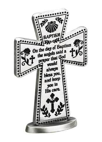 A metal standing cross with inscriptions related to baptism, on a white background.