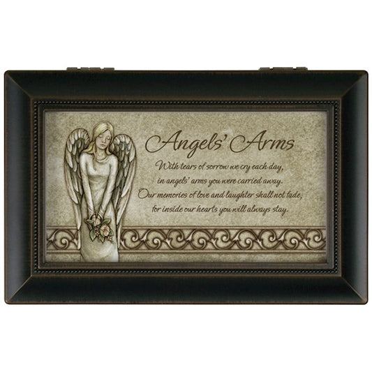 A music box with a picture of an angel on the cover, titled 'Angel's Arms', with a velvet lined interior that plays a song.