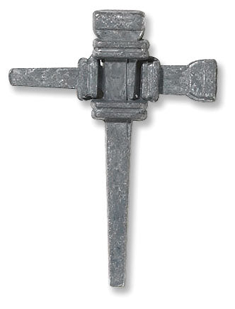 A gray metal lapel pin in the shape of a cross, resembling a nail, with an antique finish.