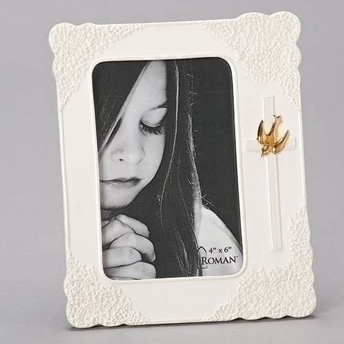 A white porcelain picture frame with a floral pattern and a gold-colored cross accent, designed to hold a 4x6 inch photo, displayed on a neutral background.