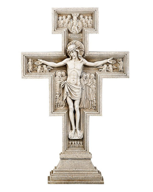 A beige San Damiano Garden Crucifix made of natural stone resin, finished on both front and back, depicting Jesus Christ on the cross with inscriptions.