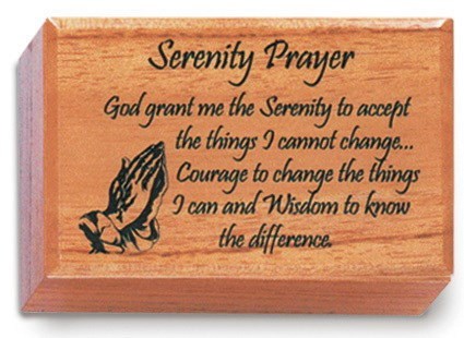 A wooden keepsake box with the Serenity Prayer inscribed on the lid.