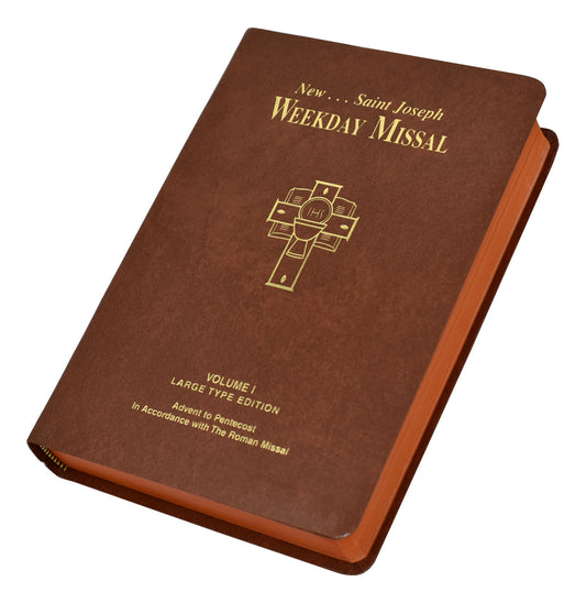 A brown, imitation leather bound Saint Joseph Weekday Missal, Volume I with gold embossed titling and a cross on the cover.