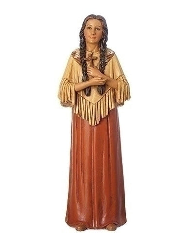 A statue of Saint Kateri Tekakwitha, depicted in traditional Native American clothing, standing with her hands clasped in front of her.