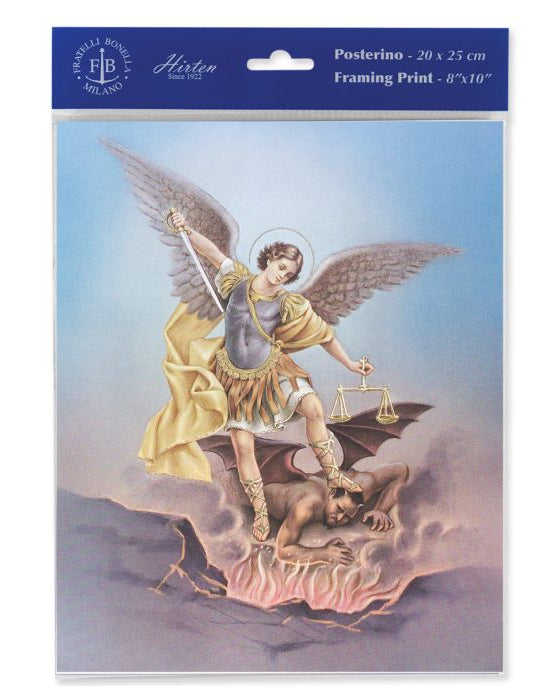 An 8 x 10 inch framed print of St. Michael standing with a sword in hand, trampling on a dragon, encased in a plastic sleeve.