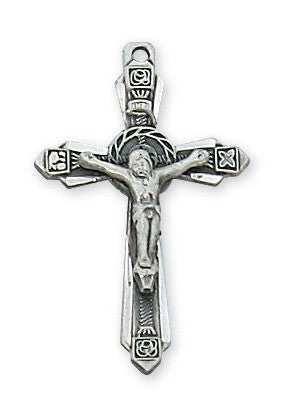 A sterling silver crucifix pendant with intricate detailing, accompanied by an 18-inch rhodium-plated brass chain, displayed against a white background.