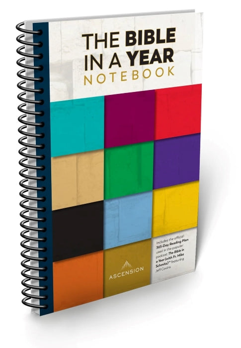 A spiral-bound notebook with a colorful cover featuring various solid colors in a grid pattern.