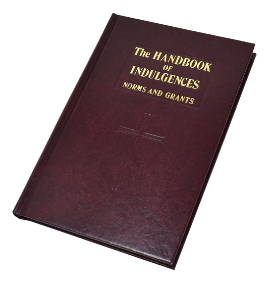 The image shows a hardcover edition of 'The Handbook of Indulgences' with a burgundy leather cover and gold lettering.