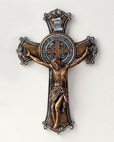 Decorative cross with religious figure on a white background