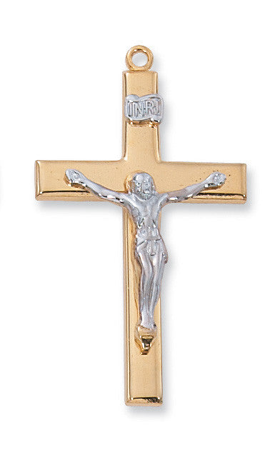 A gold over sterling silver crucifix pendant with a silver figure of Jesus Christ on a gold cross, with a deluxe gift box in the background.