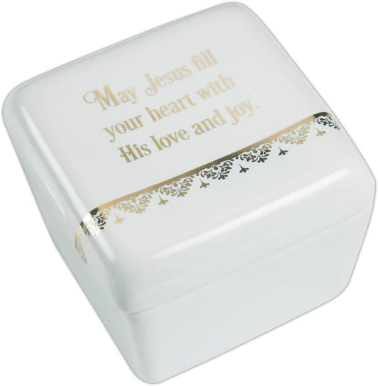 A white ceramic keepsake box with gold metallic foil design and a message in gold metallic foil on the lid.