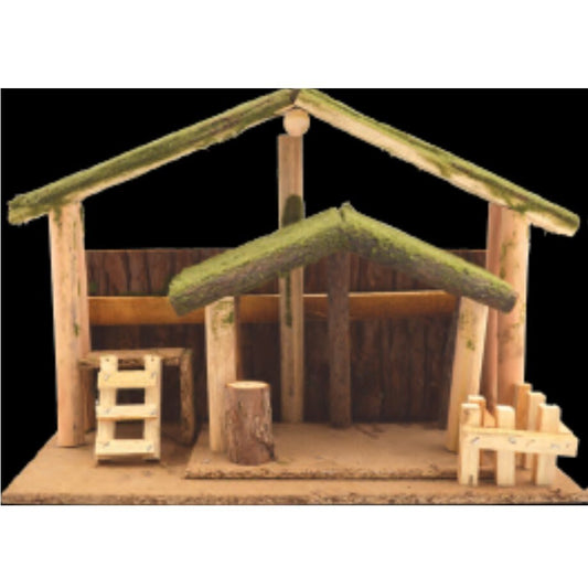 A wooden stable for a nativity set with a faux moss accent on the roof.