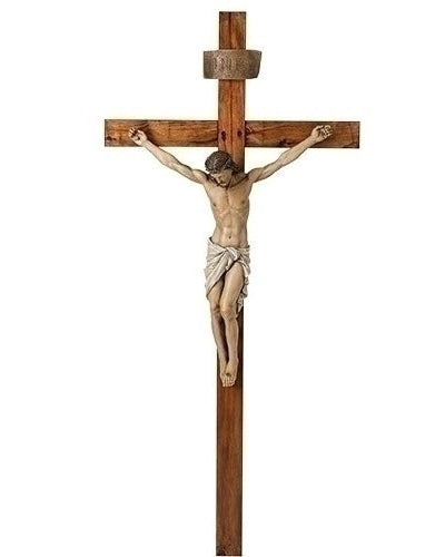 A wooden crucifix with a metal crossbar, featuring a figure of Jesus Christ on the cross.